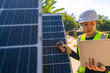 © ultramansk - Engineer inspecting solar panels using a thermal camera and a laptop for performance testing and maintenance, emphasizing renewable energy efficiency and professional sustainable energy practices.