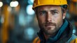 © liliyabatyrova - A skilled worker stands proudly, wearing a hard hat and safety gear, embodying commitment and expertise. Bright industrial surroundings highlight his passionate pursuit of quality craftsmanship