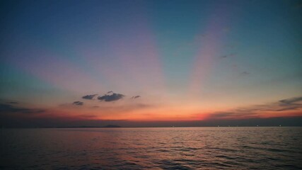 Wall Mural - 4K Beautiful sunset on the beach. the sun dives into the golden waves. incredible sea landscape. Seascape, Summer and travel vacation concept