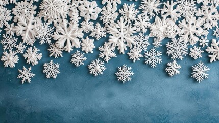 Wall Mural - White Snowflakes on Blue Background, Winter Decorative Elements, Creative Design for Holiday Seasons and Celebrations