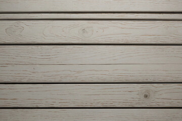 Wall Mural - A wooden surface with a grainy texture