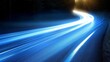 © Oleg - Dynamic abstract road with blue light trails representing data transfer speed and digital innovation