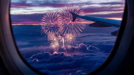 Wall Mural - A vibrant display of fireworks in the evening sky view from an airplane window