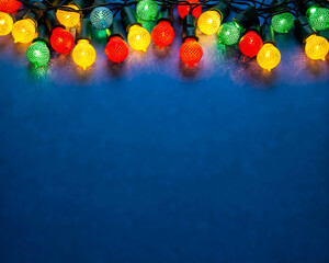 Wall Mural - christmas colorful light border on blue background