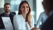 © Alexander - Smiling businesswoman during a meeting