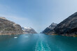 © MJ_Nightingale - Prins Christian Sund Greenland mountain fjord with floating ice and shore iceberg on a summer day