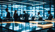 © astaszczyk - Blurred people in motion working in the modern office.
