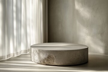 Wall Mural - Minimalist round concrete stool placed in a sunlit modern interior with soft shadows