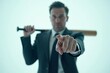 © Andrew505 - Aggressive Businessman with Baseball Bat Displaying Threatening Posture in Corporate Environment - Business Conflict and Workplace Violence Conceptual Imagery for Security Awareness