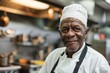 © NikoG - Portrait of a senior male chef in kitchen