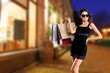 © BillionPhotos.com - Beautiful young happy woman hold shopping bags
