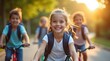 © Natsumae - Joyful children ride bikes, bathed in golden sunset light, backpacks on; pure happiness and carefree fun.