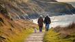 © Daily Stock - An elderly couple walking their small dog along a scenic coastal path.