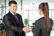 © BillionPhotos.com - Handshake, agreement deal of business people in office