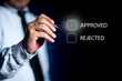 © bigjom - Businessman writing or tick correct mark to approve. check electronic documents on virtual screen. business success concept. Personal development and career growth or change yourself concept.