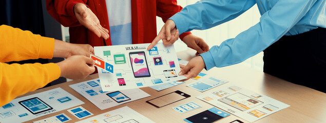 Wall Mural - panorama banner of startup company employee planning on user interface prototype for mobile applicat
