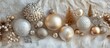 © MUMTAZ - Elegant ornaments in gold and silver tones arranged on a textured white background.