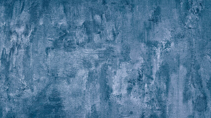 Aufkleber - A blue wall with a textured surface. The wall is painted in a light blue color. The wall has a rough texture