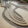 © siyons - Abstract sand and gravel design in a zen garden.