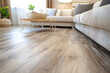 © Catherine - Stylish and Modern Living Room Interior Design Featuring Oak-Shade Vinyl Flooring