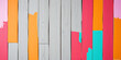 © PuriStudio - Colorful wooden background with vibrant shades of pink, red, orange, and grey painted in vertical stripes, creating lively and artistic atmosphere