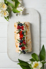 Wall Mural - Meringue roll, concept of tasty and delicious food