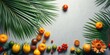 © Backdrop Bliss - A vibrant composition of tropical fruit and foliage on a gray background with a soft, natural light
