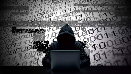 Hacker working on laptop on abstract digital background