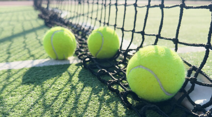 Tennis ball on grass tennis court