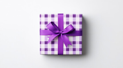 Wall Mural - beautifully wrapped gift box in purple checkered pattern with matching ribbon, perfect for special occasions and celebrations