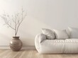 © PERFECTisME - A white sofa with pillows in a minimalist living room with a vase of dried branches