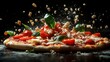 © Ummeya - Fresh pizza ingredients including tomatoes and cheese flying mid-air in a creative food concept.