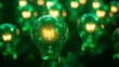 © graja - Bright idea concept with light bulbs glowing on green background.