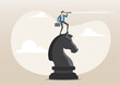 © tujuh17belas - businessman leader standing on chess knight using telescope