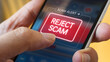 © Iamflow2468 - Spam call scam prevention concept. Rejecting a scam alert on a smartphone screen.