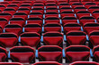 © atosan - Perspective of many empty red stadium seats