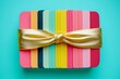 © Eakkarin - hyper realistic photo of  Top view colourful Shop gift cards in shape of present box with a bow of satin ribbon on bright turquoise background