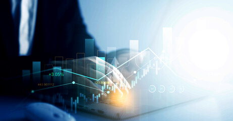 Leinwandbilder - Businessman using laptop for analyzing data sales and financial graph chart. Business development strategy,analysis and planning.Financial marketing graph and profit stock market.	