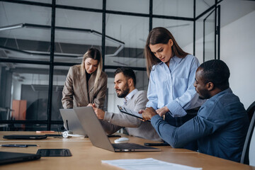 Colleagues are together. Professional workers are in the modern office