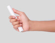 © Hammad - Closeup Photo Of A Male Hand Gripping A New White PVC Plastic Pipe Isolated On White Background