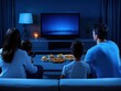 © Noppakun - Family Enjoying Movie Night at Home with Pizza and Snacks in Cozy Living Room Surrounded by Warm Ambiance and Soft Blue Lighting