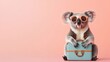 © Chexy139 - A koala wearing aviator goggles sits with a light blue suitcase in front of a soft pastel background, exuding a playful, adventurous spirit perfect for travel