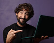 © kues1 - young bearded crazy man with a laptop
