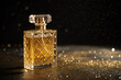 © martina87 - Bottle of golden perfume on shimmering dark background