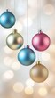 © Maria - Christmas Ornament Elegance: Five festive Christmas ornaments, in a spectrum of colors, hang gracefully against a backdrop of glittering bokeh lights.