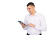 © PeopleVideos - Focused businessman using a digital tablet