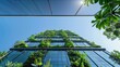 © abdul - a modern building with a green facade, integrating nature into its architecture.