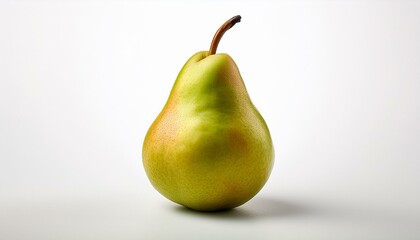 Wall Mural - A single ripe pear on a white background.  A vibrant, healthy fruit.