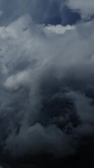 Wall Mural - Lot of lightning during a thunderstorm. Storm clouds are moving fast on the viewer, timelapse. Vertical video