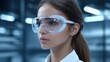 © Premium Illustration - Young woman wearing safety goggles focused in laboratory or research center, science experiment, technology innovation, professional work environment, blurred futuristic blue background, modern healt